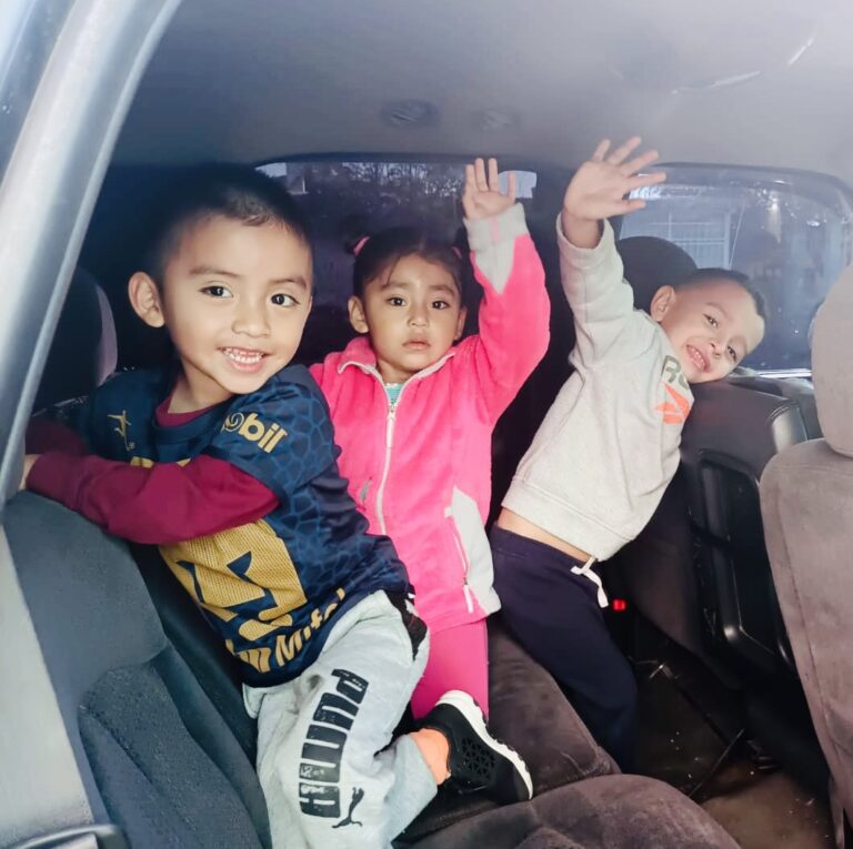 children-waving